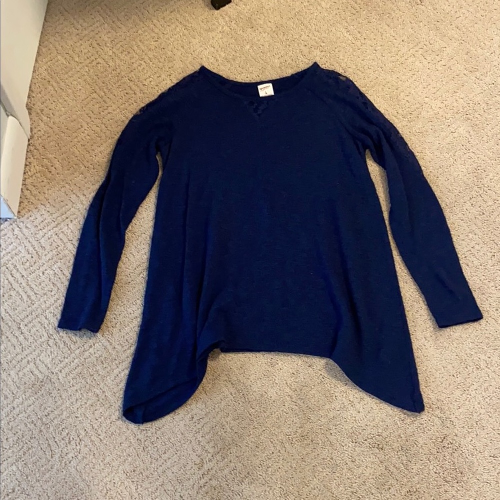 I’m selling a dark blue long sleeve shirt.